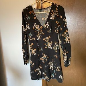 Black long-sleeve mini dress with floral print